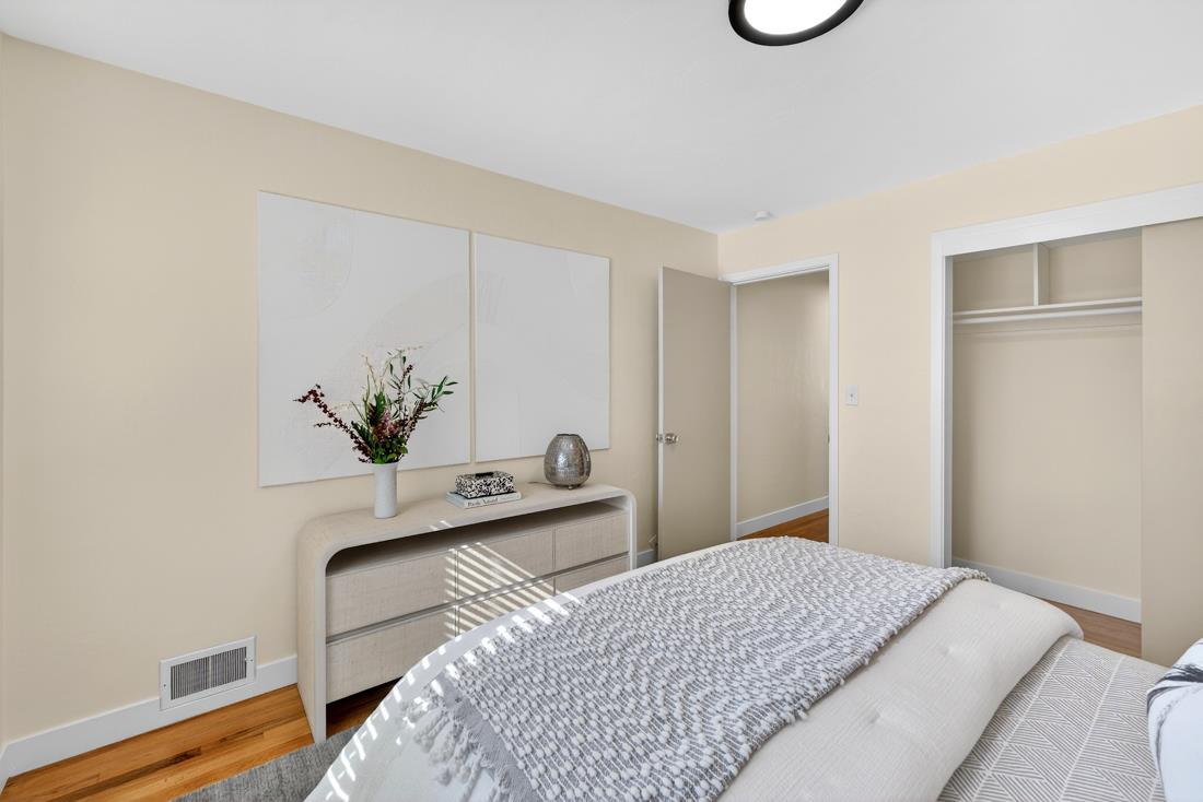 2991-2987 Almaden Road San Jose, CA 95125 - Photo 33 of 60 a bedroom with a bed and a table