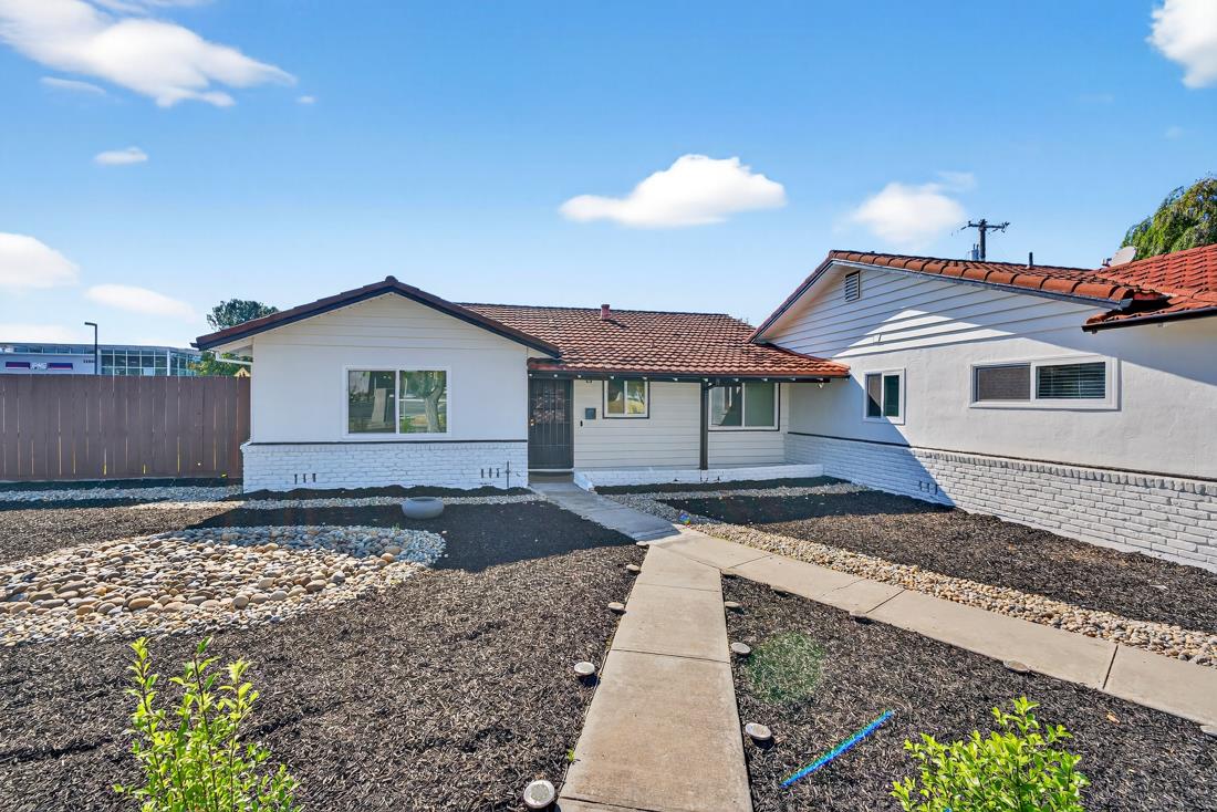 2991-2987 Almaden Road San Jose, CA 95125 - Photo 5 of 60 a front view of a house with a yard