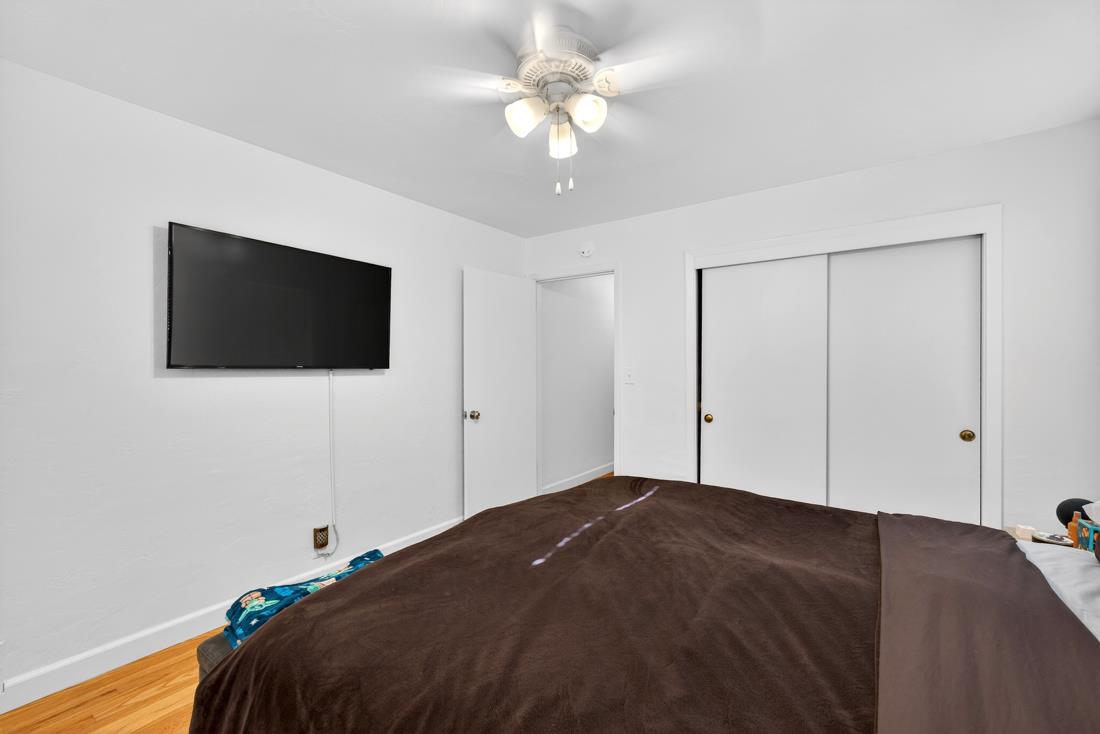 2991-2987 Almaden Road San Jose, CA 95125 - Photo 53 of 60 a bedroom with a bed and a flat screen tv
