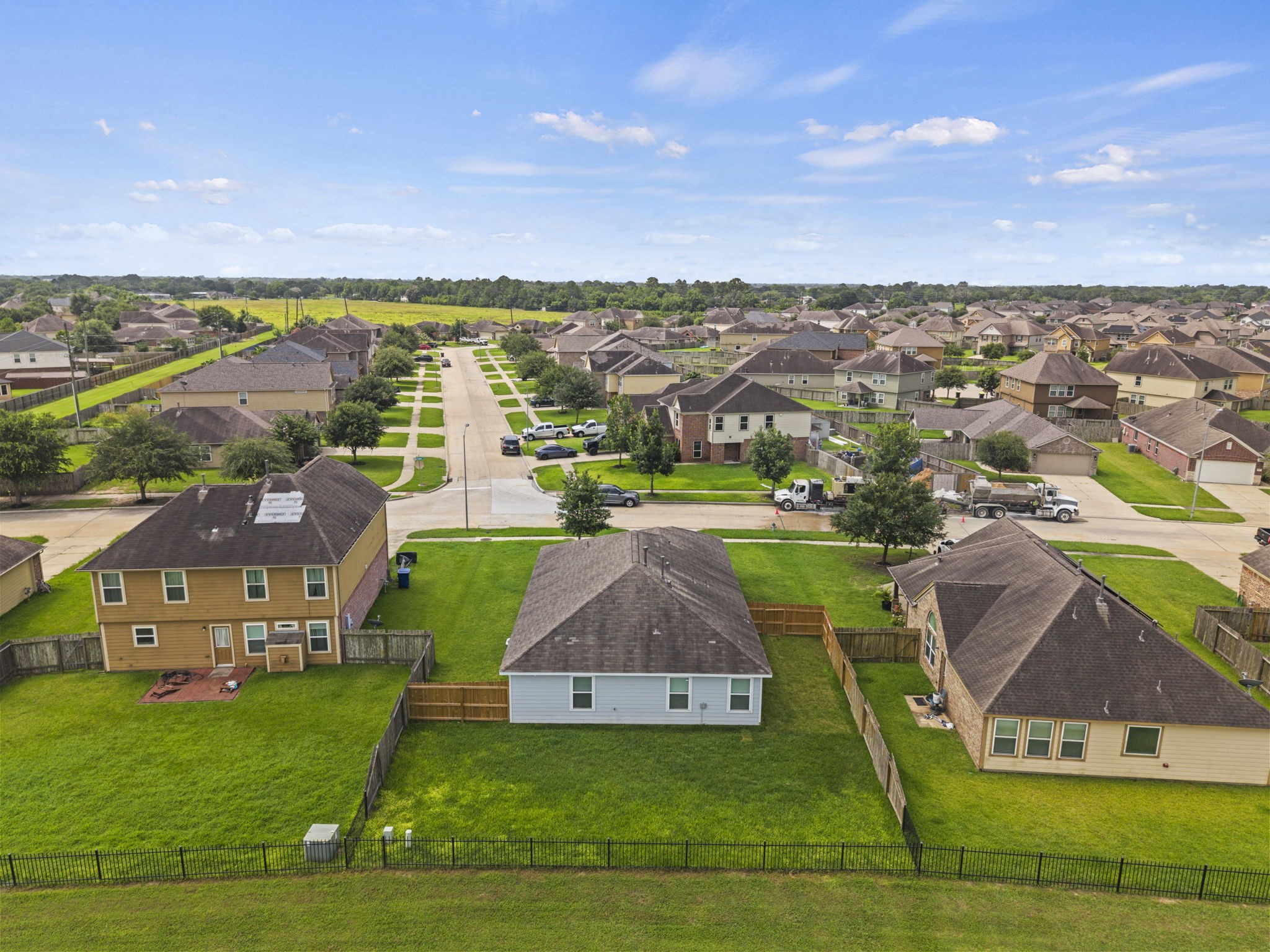 2110 Red Cedar Trail Rosenberg, TX 77471 - Photo 20 of 20 Looking out beyond the property line, you can see the cohesive layout of this quiet residential community.