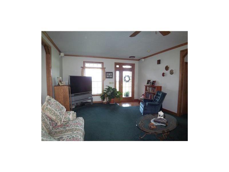 173 Anderson Road New Wilmington, PA 16142 - Photo 13 of 24 Hosting get togethers is no problem with this large living room/ dining room space.
