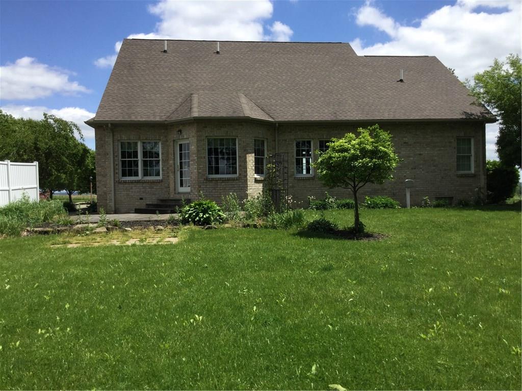 173 Anderson Road New Wilmington, PA 16142 - Photo 21 of 24 Back of the home has a cement patio and brick pavers.