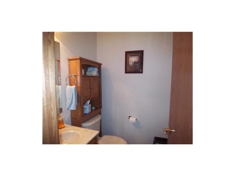 173 Anderson Road New Wilmington, PA 16142 - Photo 8 of 24 Half bath on first floor has lovely hard wood floors and oak trim.