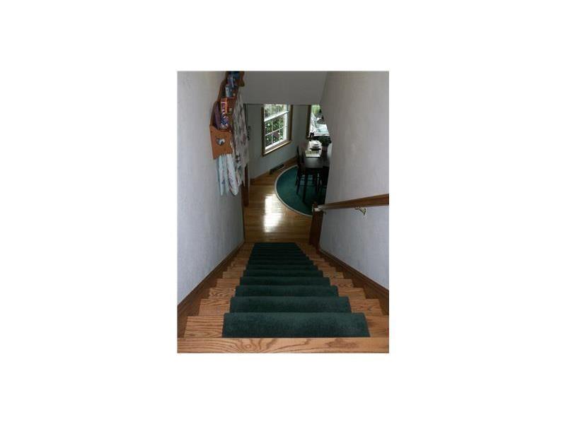 173 Anderson Road New Wilmington, PA 16142 - Photo 9 of 24 Oak staircase leads to the second floor.