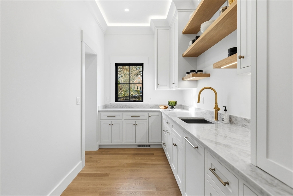 9 Tuttle Lane Lynnfield, MA 01940 - Photo 13 of 42 a kitchen with sink and cabinets