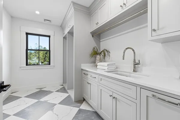 a close view of a sink a faucet and a in a kitchen