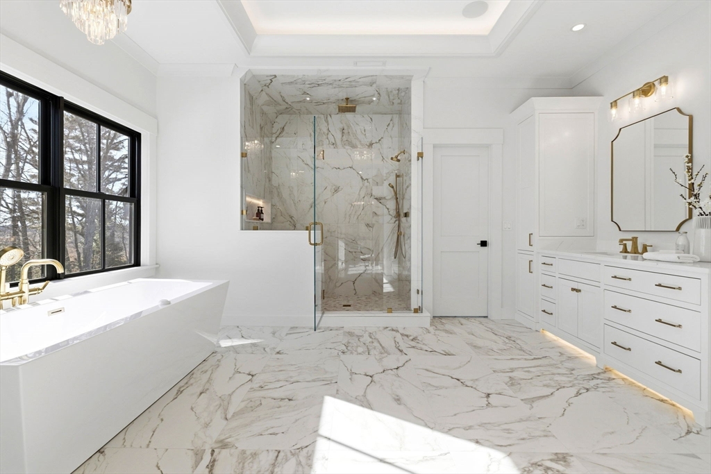 9 Tuttle Lane Lynnfield, MA 01940 - Photo 23 of 42 a bathroom with a granite countertop sink mirror and shower