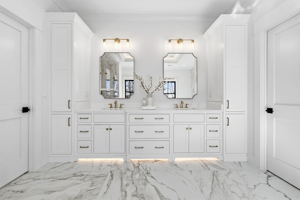 9 Tuttle Lane Lynnfield, MA 01940 - Photo 24 of 42 a spacious bathroom with double sink and a mirror