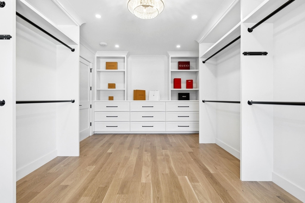 9 Tuttle Lane Lynnfield, MA 01940 - Photo 26 of 42 a view of walk in closet with clothes and window