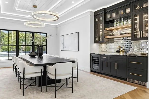 a kitchen with a table and chairs in it