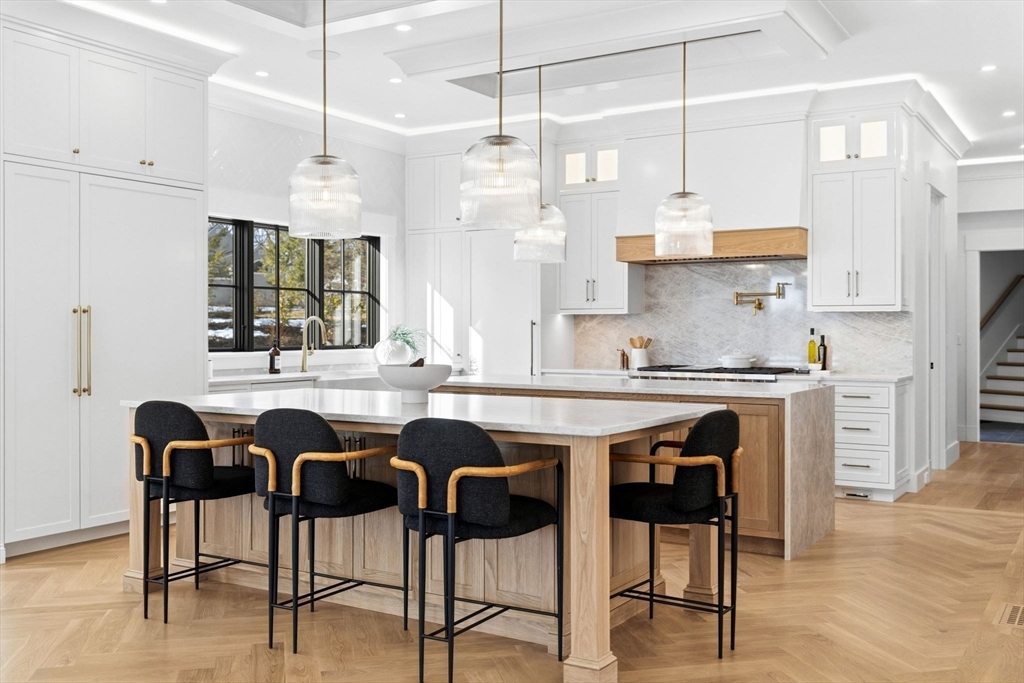 9 Tuttle Lane Lynnfield, MA 01940 - Photo 9 of 42 a kitchen with stainless steel appliances granite countertop a stove a sink and a refrigerator