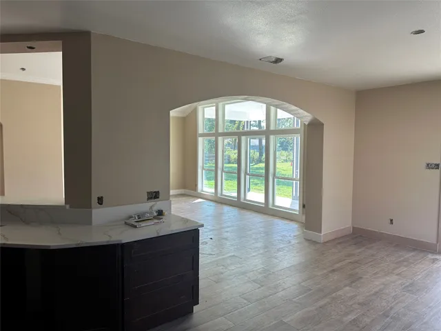 a bathroom with a sink and a window