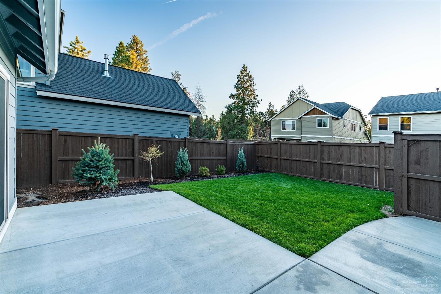 20167 Roper Lane, Unit LOT 30 Bend, OR 97703 - Photo 14 of 24 fenced and landscaped back yard of finis