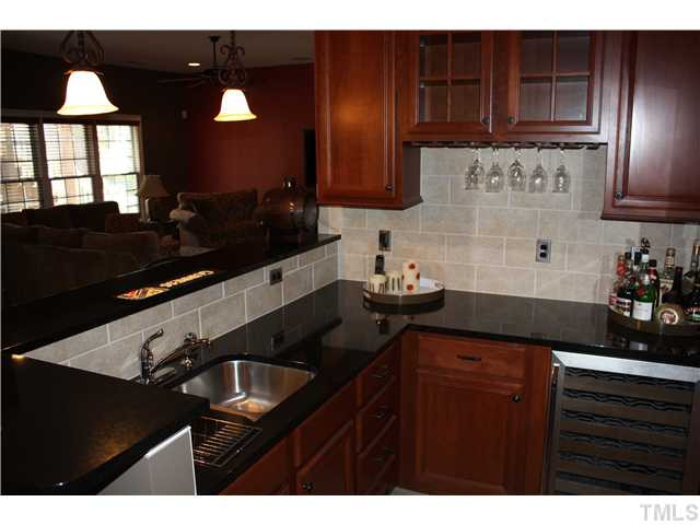 2826 Winter Song Road Raleigh, NC 27614 - Photo 14 of 25 Finished Basement granite wet bar/kitchenette Basement