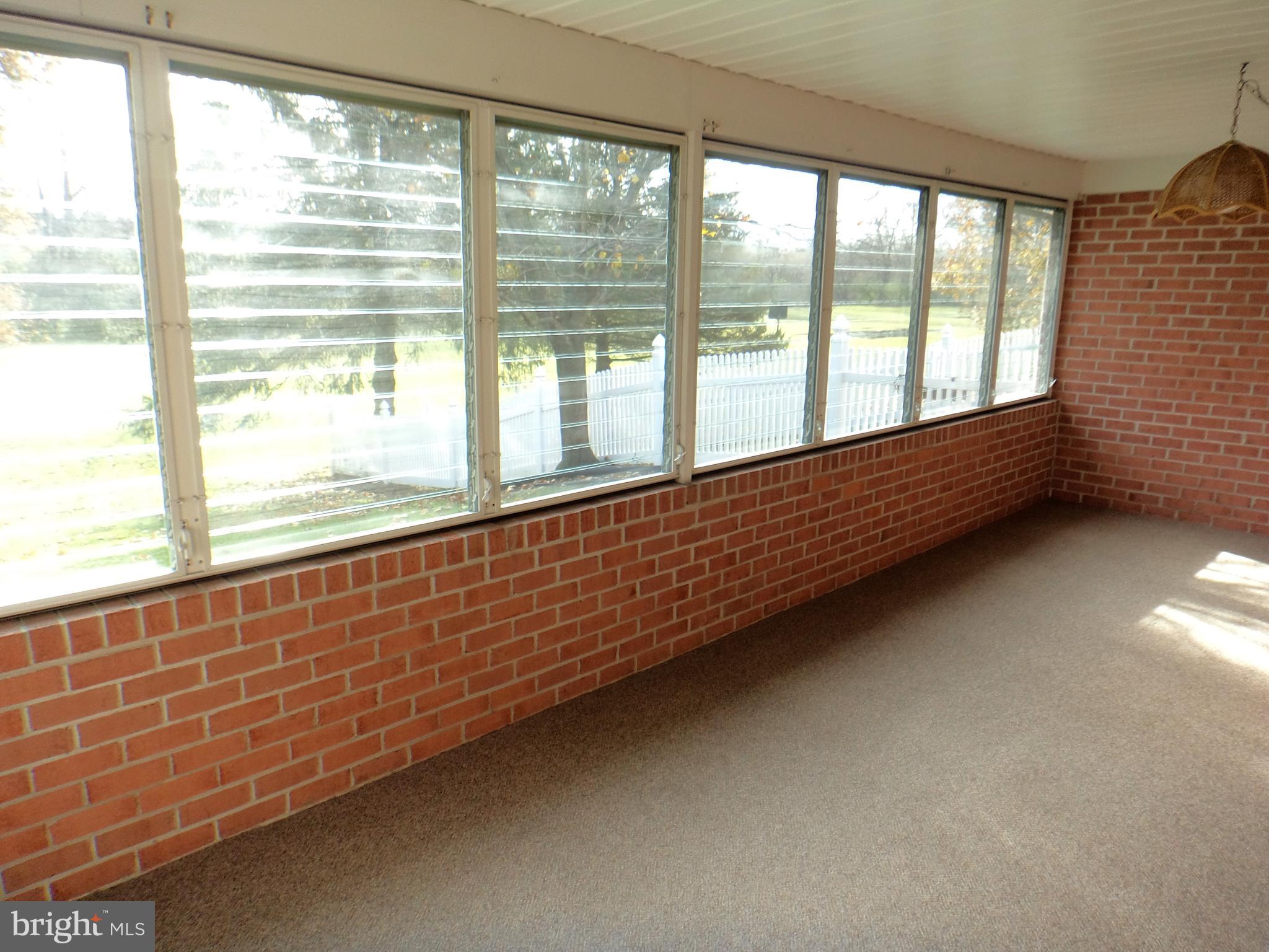 214 Minnich Road Chambersburg, PA 17201 - Photo 18 of 23 Enclosed rear porch