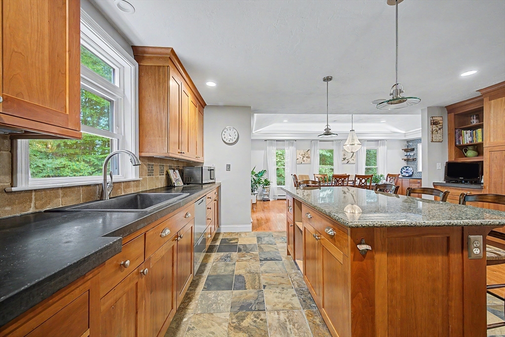 4 Dicarlo Road Hopkinton, MA 01748 - Photo 6 of 41 a large kitchen with stainless steel appliances granite countertop a sink and counter space