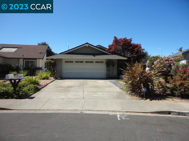 868 Mariners Point Rodeo, CA 94572 - Photo 1 of 1 a front view of a house with a yard