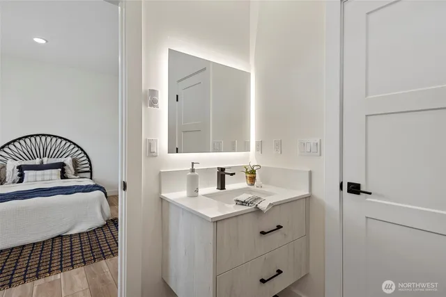 a bathroom with a sink and a mirror