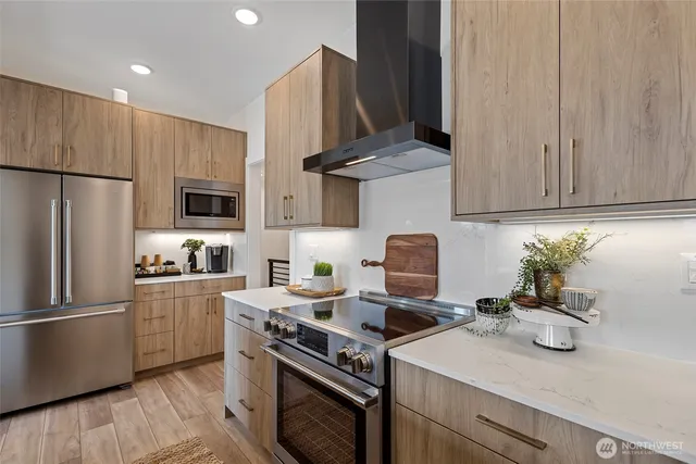 a kitchen with a sink a stove and refrigerator
