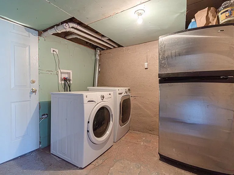 1144 West 68th Street, Unit 1 Chicago, IL 60621 - Photo 14 of 14 a utility room with dryer and washer