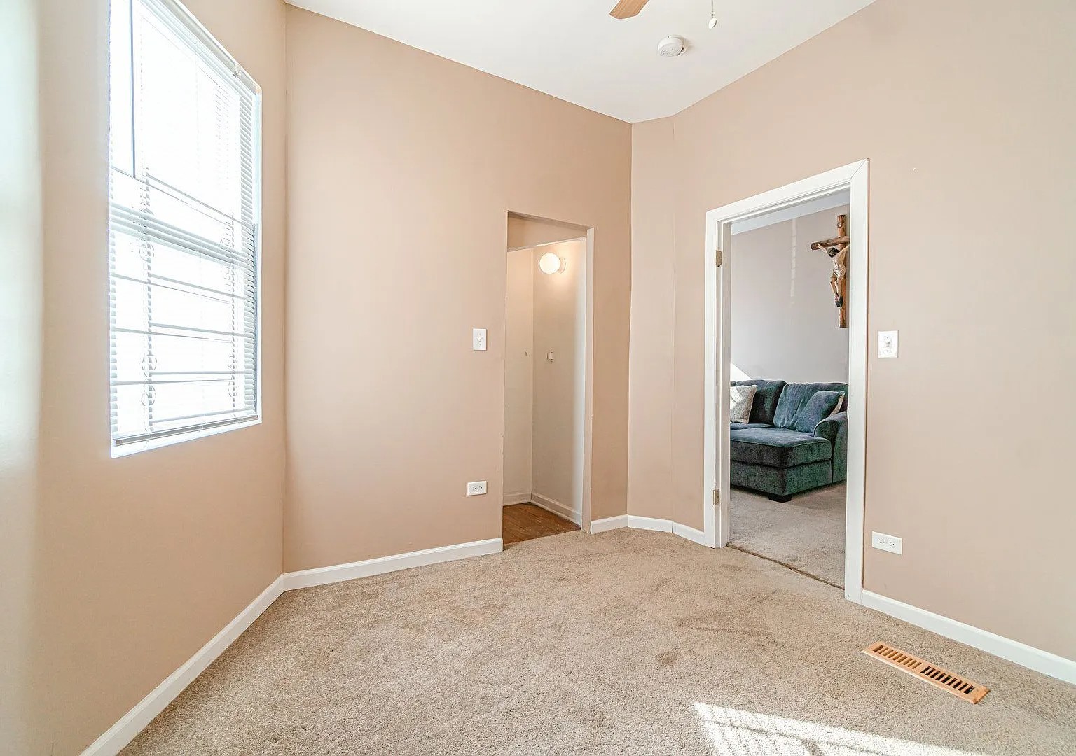 1144 West 68th Street, Unit 1 Chicago, IL 60621 - Photo 9 of 14 a view of a room that has a bed and a window