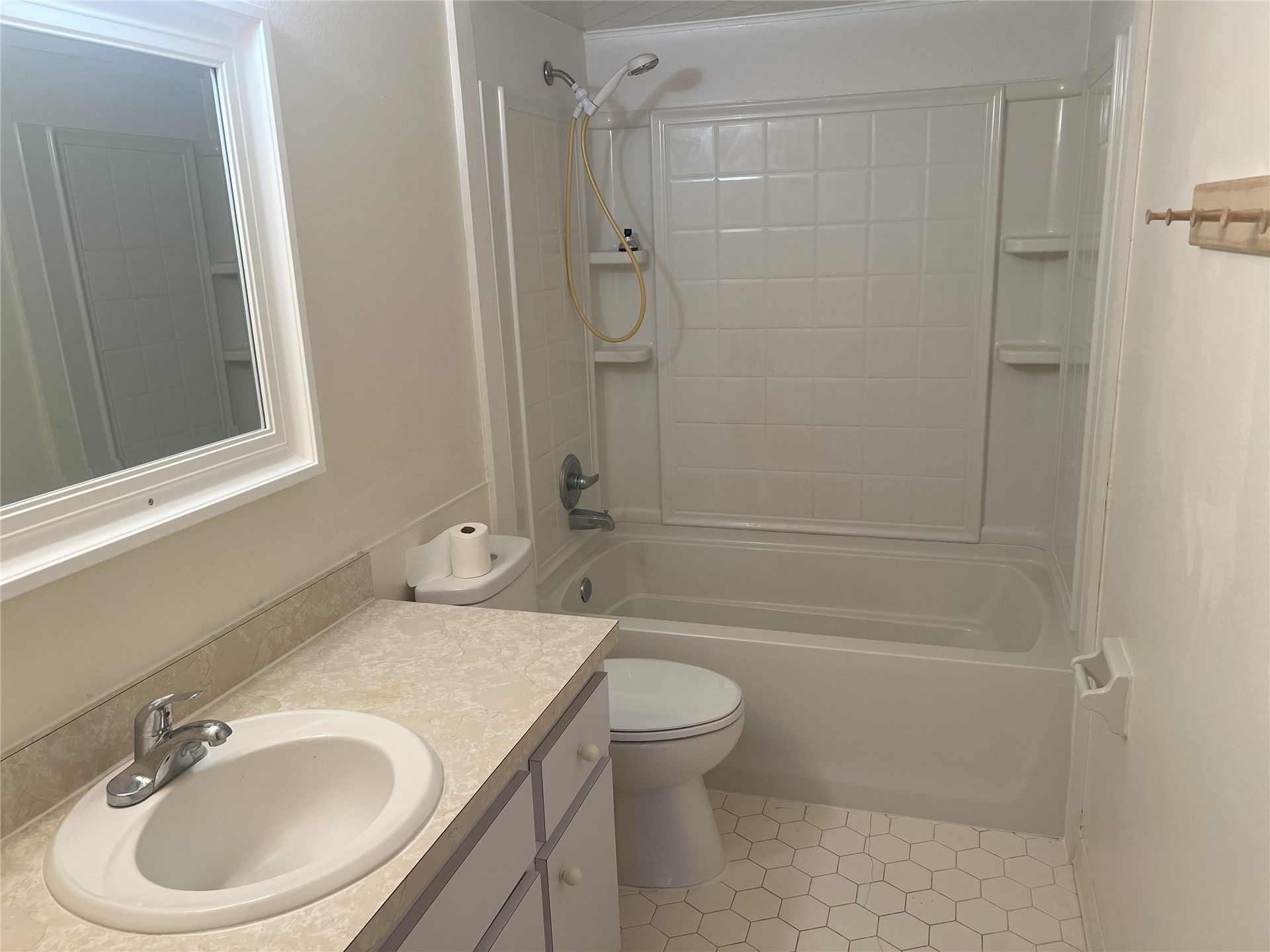 348 Tarpon Avenue Fernandina Beach, FL 32034 - Photo 22 of 44 a bathroom with a sink a toilet and shower
