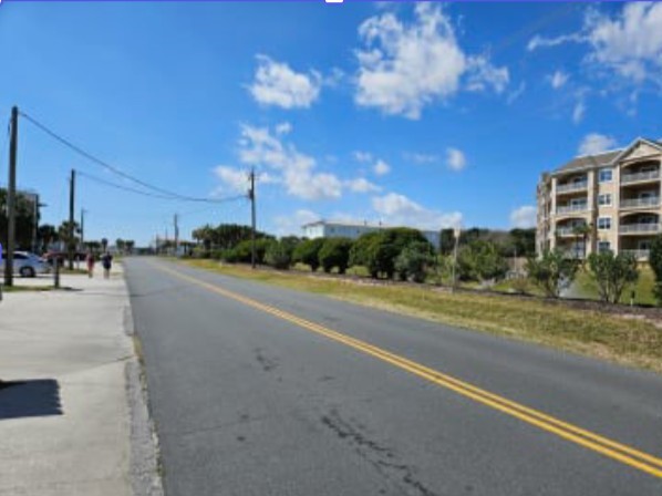 348 Tarpon Avenue Fernandina Beach, FL 32034 - Photo 29 of 44 a view of a street with a building