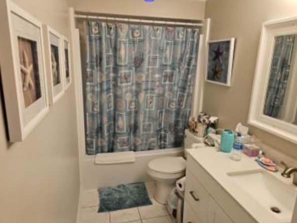348 Tarpon Avenue Fernandina Beach, FL 32034 - Photo 6 of 44 a bathroom with a sink toilet and shower
