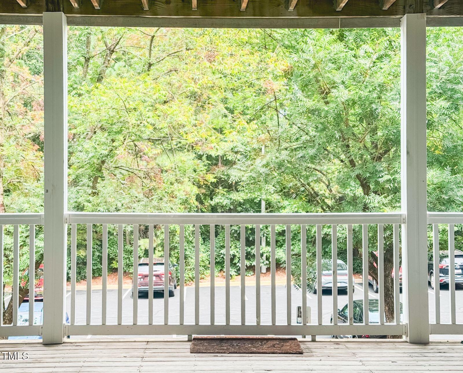 1911 Wolf Tech Lane, Unit 204C Raleigh, NC 27603 - Photo 18 of 18 a view of a balcony with a yard