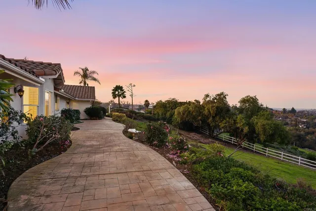 a view of a house with a big yard