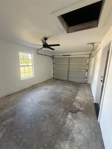 a view of empty room with windows