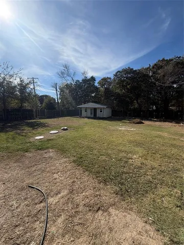 a view of a lake with a city