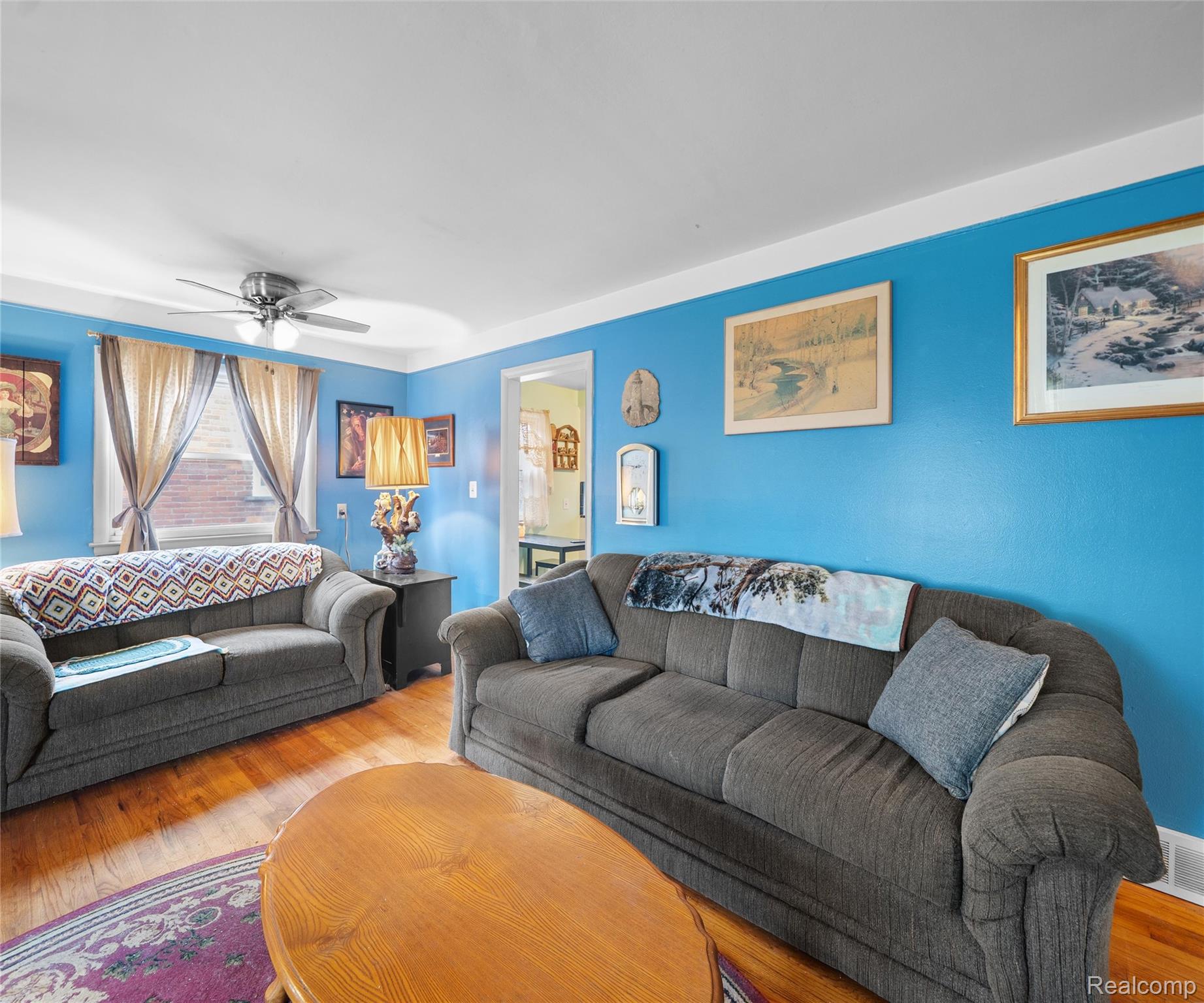 28940 Grandview Street Inkster, MI 48141 - Photo 7 of 41 Living area featuring wood finished floors and a ceiling fan