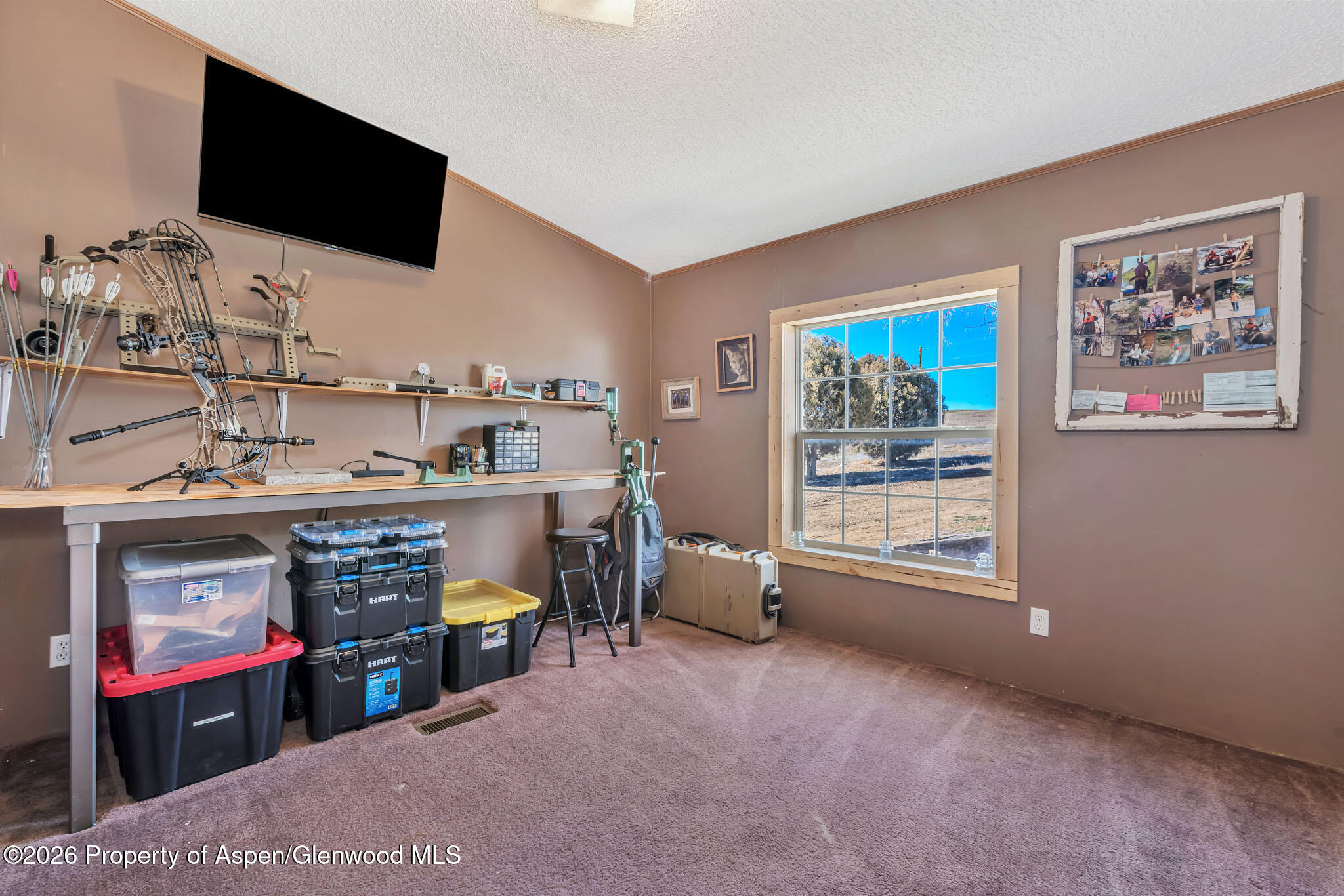 275 Roberts Road Craig, CO 81625 - Photo 27 of 47 a room with storage and utility