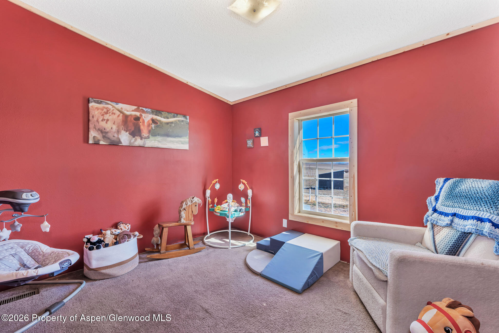 275 Roberts Road Craig, CO 81625 - Photo 32 of 47 a living room with furniture and a window