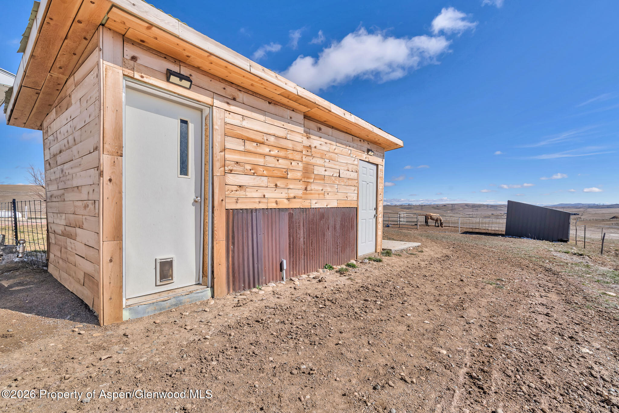 275 Roberts Road Craig, CO 81625 - Photo 37 of 47 a view of backyard with garage