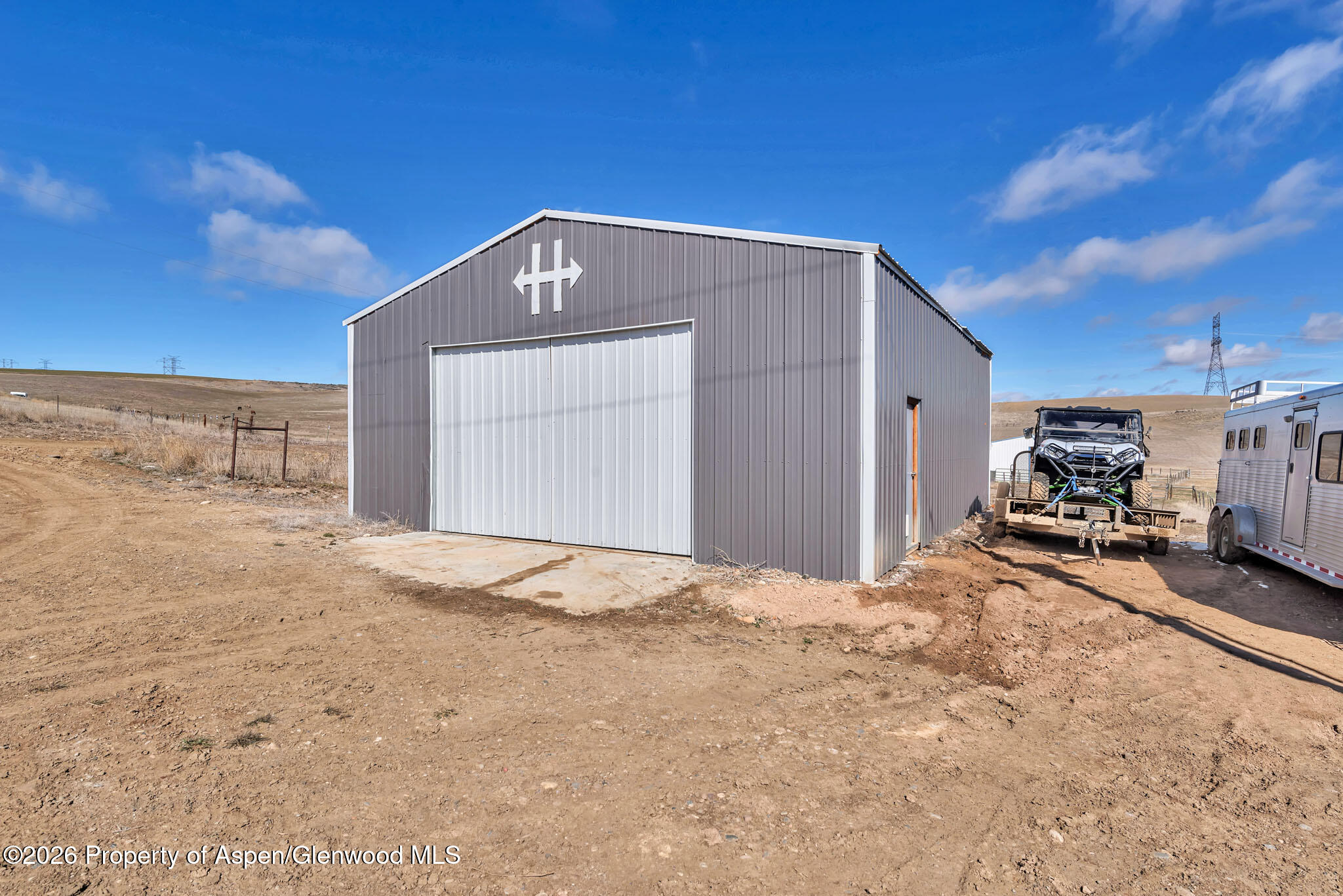 275 Roberts Road Craig, CO 81625 - Photo 38 of 47 a view of a house with a snow in the background