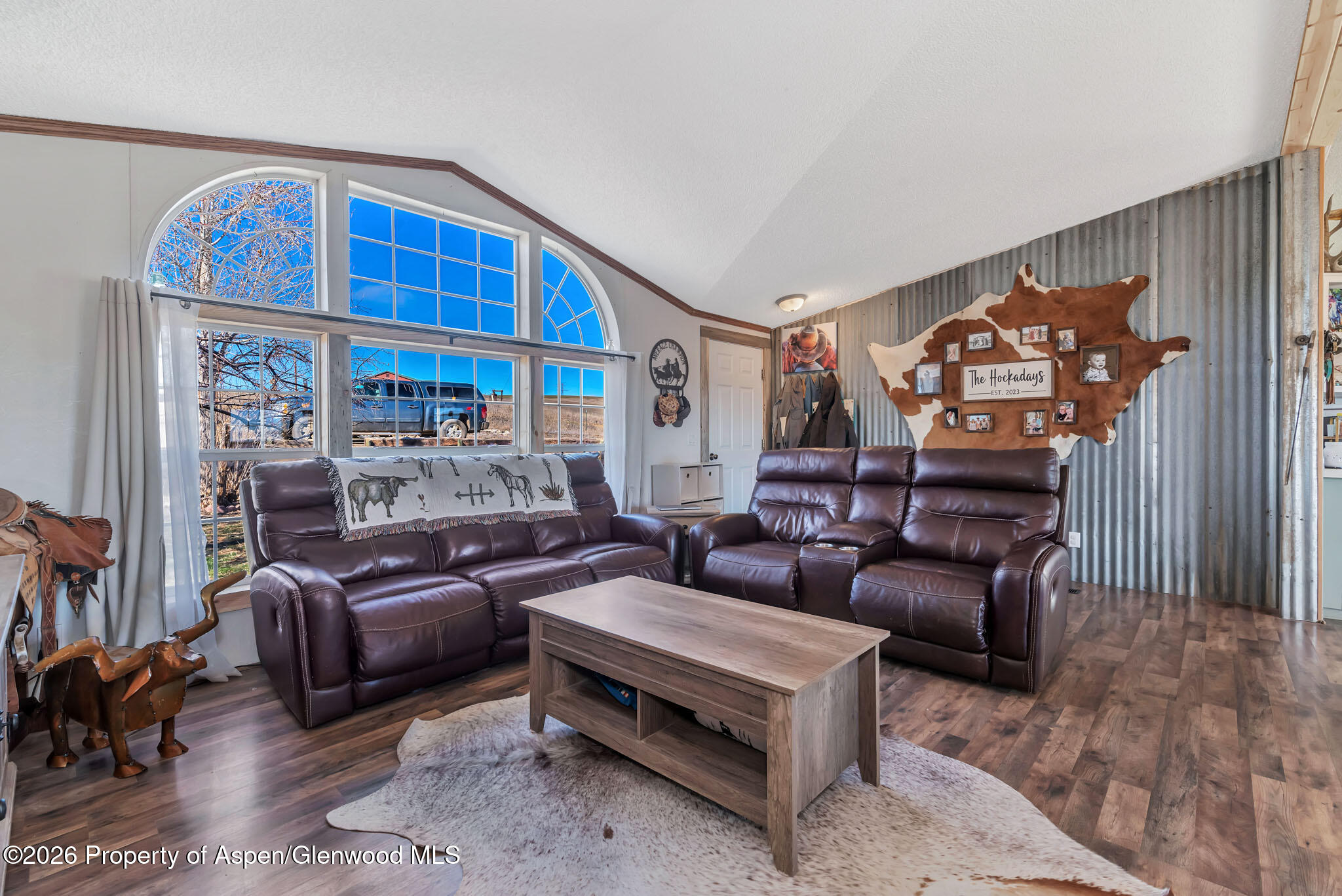 275 Roberts Road Craig, CO 81625 - Photo 8 of 47 a living room with furniture a rug and a window