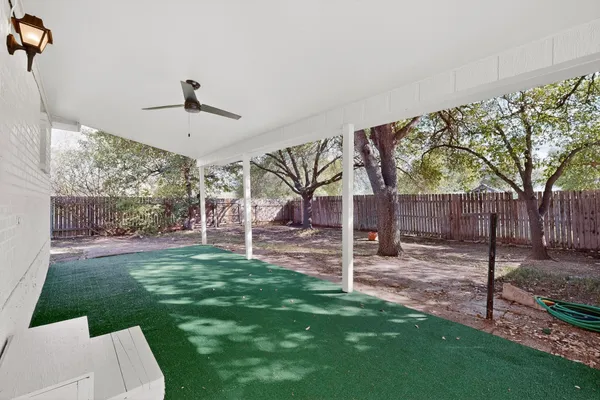 a house with trees in front of it