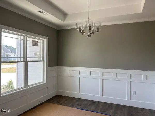 a view of cabinets and window