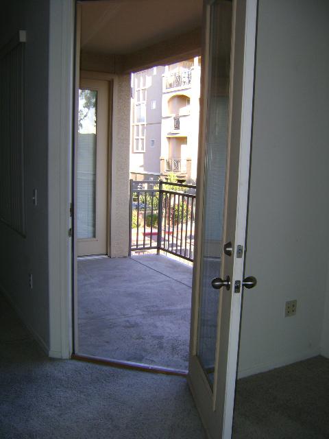 909 East Camelback Road, Unit 2001 Phoenix, AZ 85014 - Photo 9 of 10 balcony door from living room