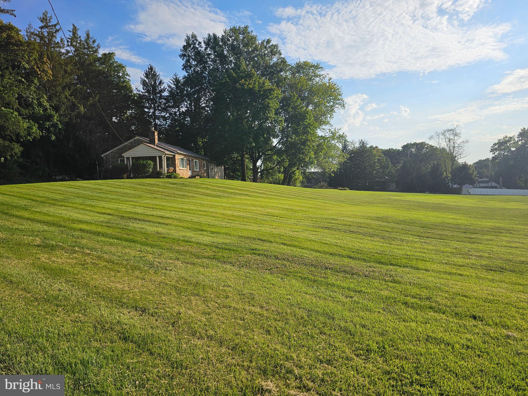 1531 North Reading Road Stevens, PA 17578 - Photo 17 of 17 a view of a big room with a big yard and large trees