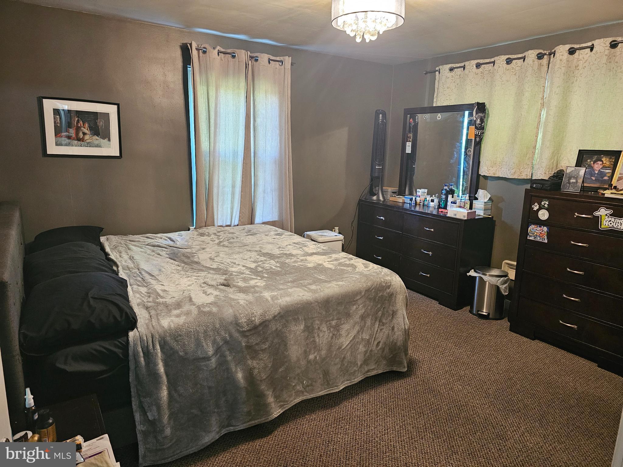 1531 North Reading Road Stevens, PA 17578 - Photo 9 of 17 a bedroom with a bed dresser and a large mirror