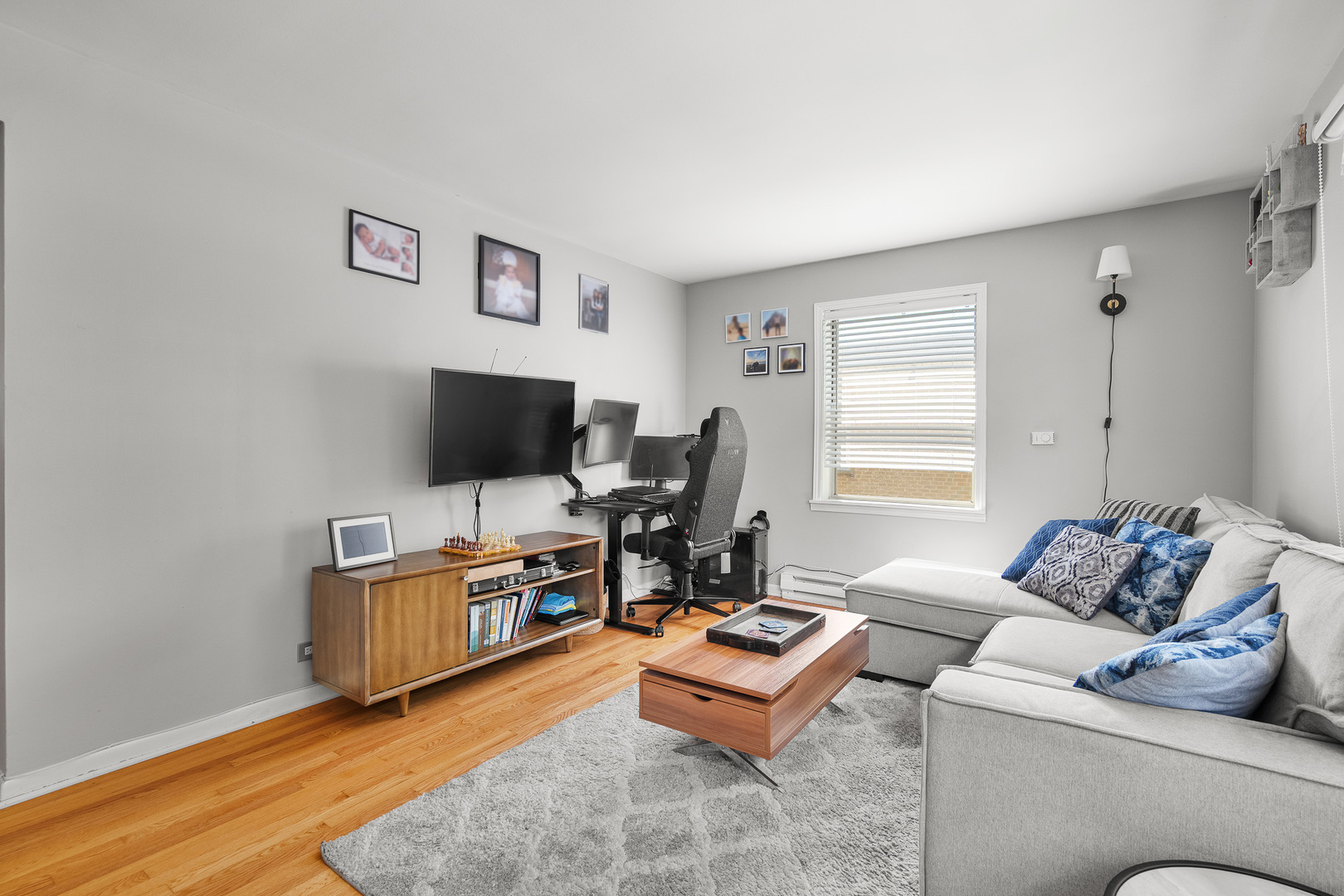 1415 Homestead Road, Unit 8 La Grange Park, IL 60526 - Photo 6 of 16 a living room with furniture and a flat screen tv