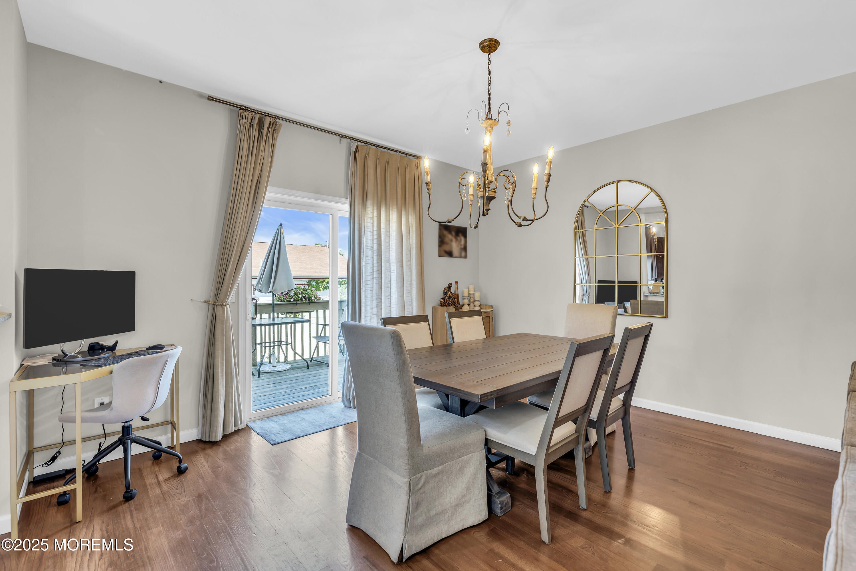 31 Ocean Avenue Middletown, NJ 07748 - Photo 11 of 39 a view of a dining room with furniture window and wooden floor