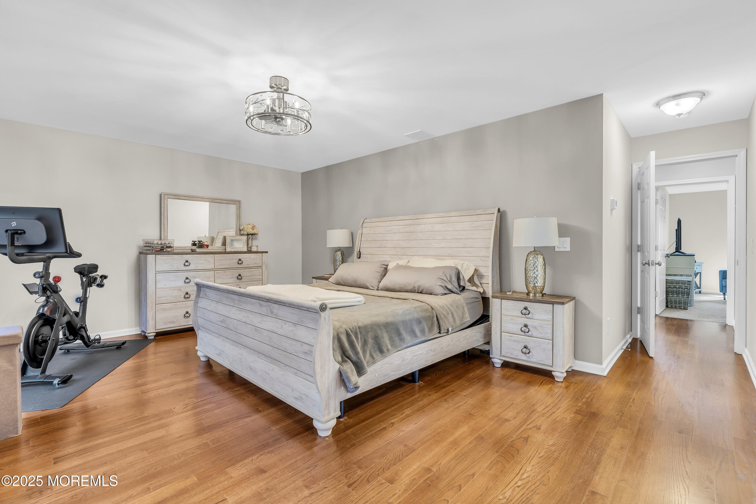 31 Ocean Avenue Middletown, NJ 07748 - Photo 22 of 39 a spacious bedroom with a bed and a table