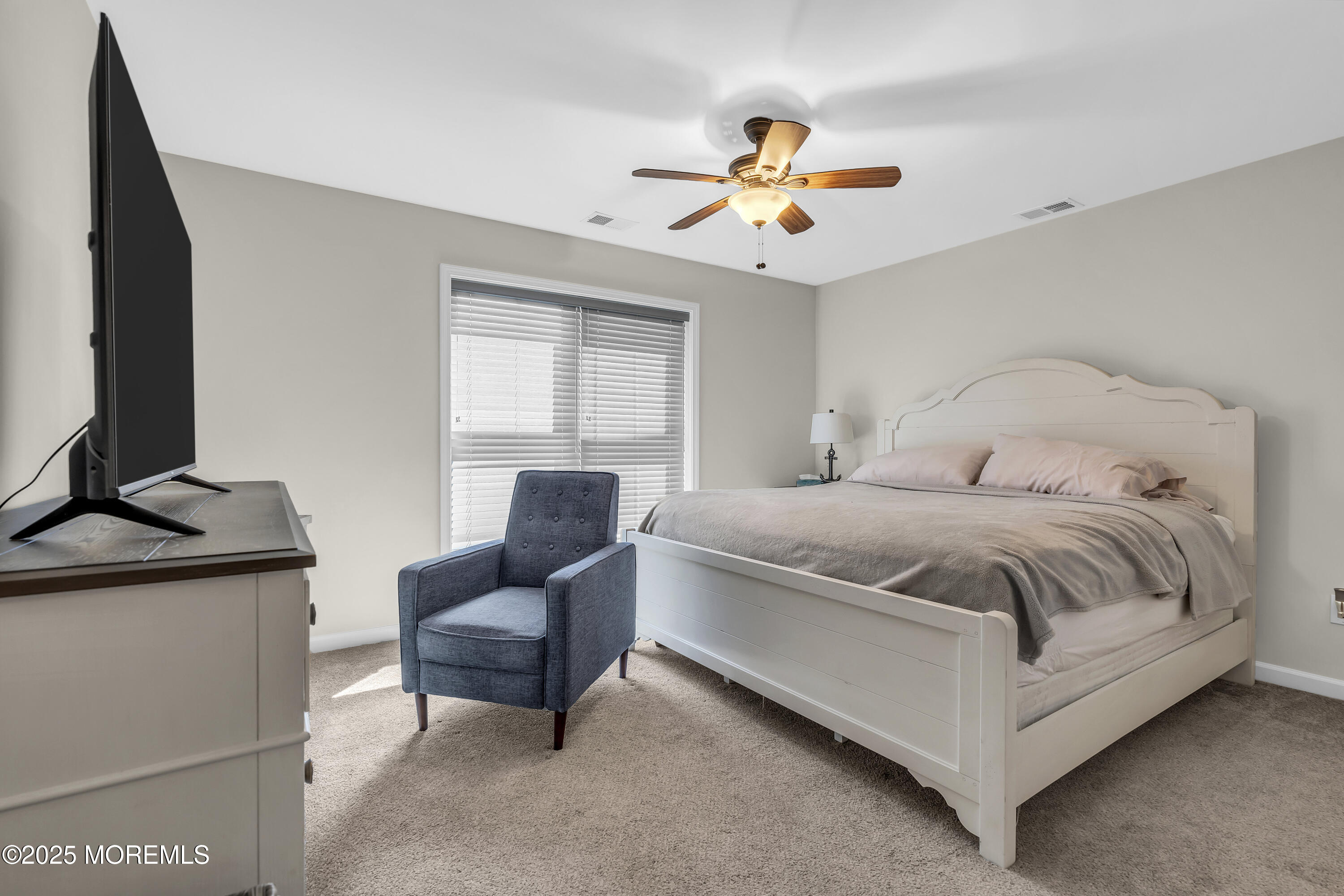 31 Ocean Avenue Middletown, NJ 07748 - Photo 27 of 39 a bedroom with a bed and couch