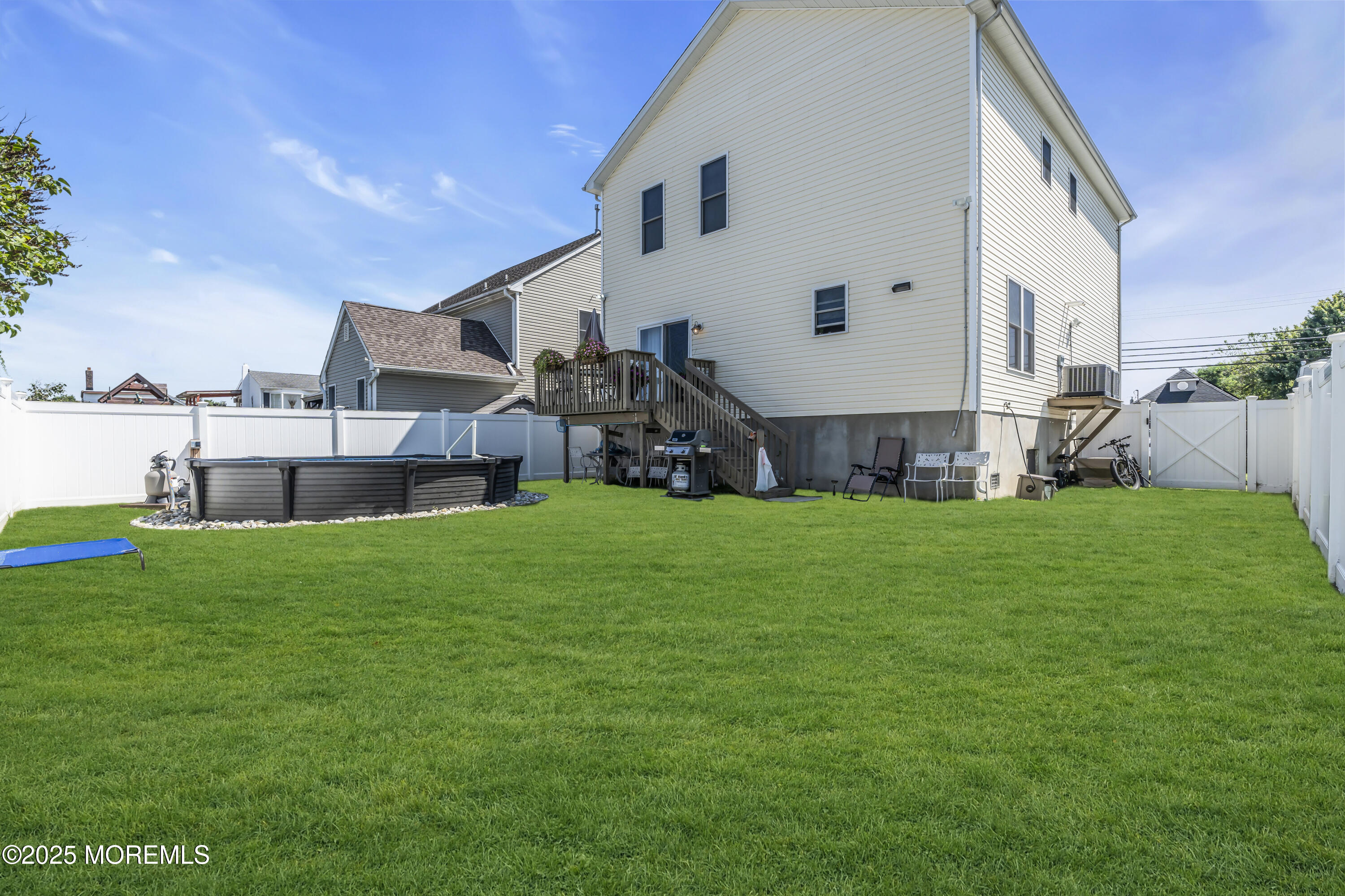 31 Ocean Avenue Middletown, NJ 07748 - Photo 32 of 39 a house view with a garden space