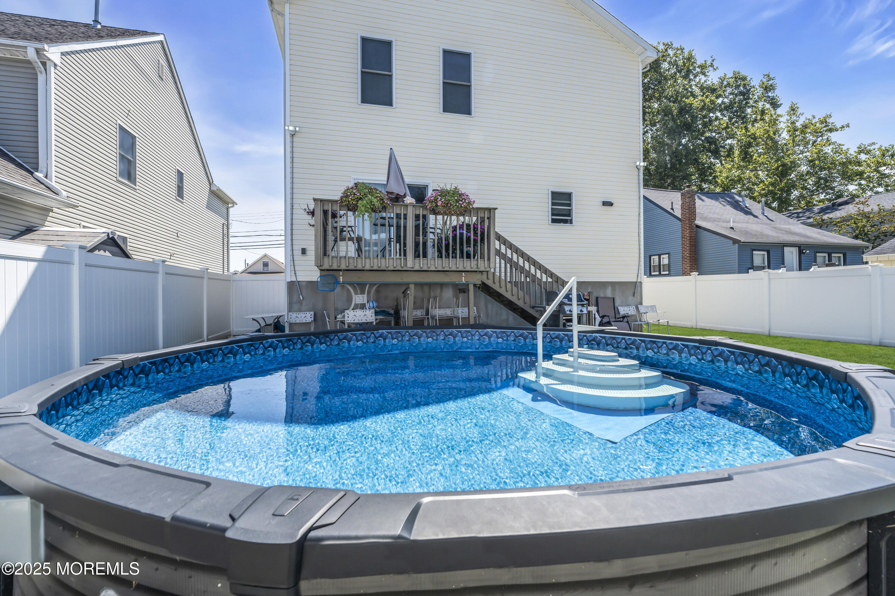 31 Ocean Avenue Middletown, NJ 07748 - Photo 34 of 39 a swimming pool with a outdoor seating