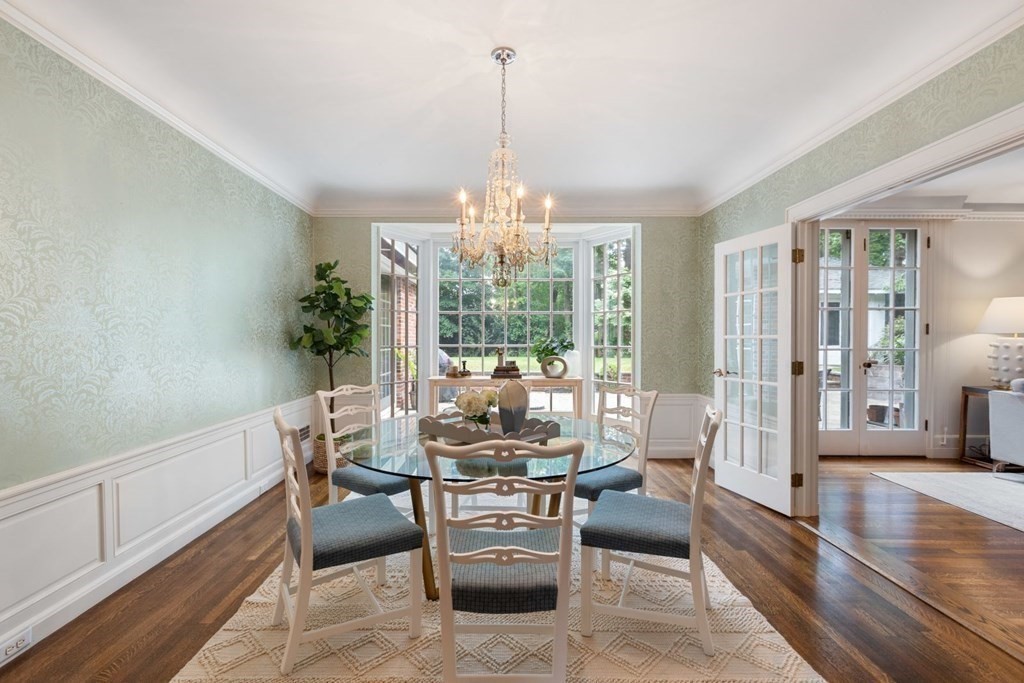 36 Audubon Road Wellesley, MA 02481 - Photo 13 of 40 a living room with furniture and a chandelier